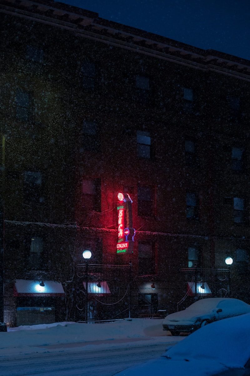 view of brown building at night